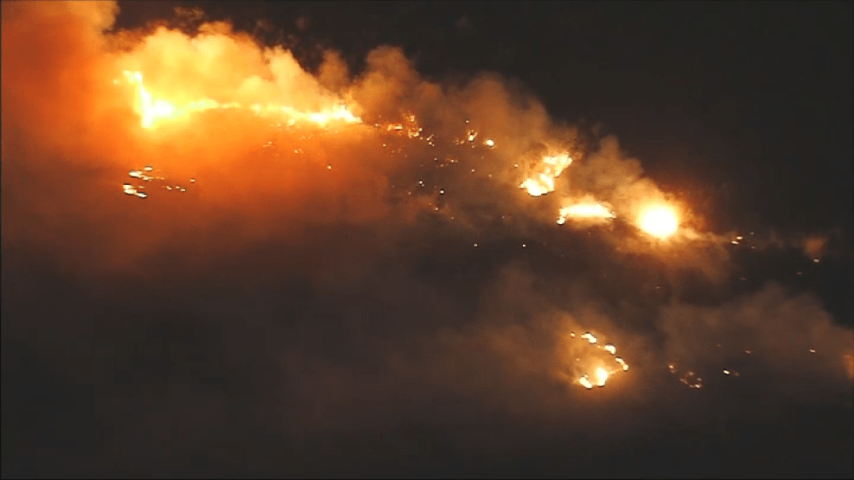 Brush fire threatens homes in Eastvale