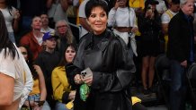 Kris Jenner attends a playoff basketball game between the Los Angeles Lakers and the Golden State Warriors.