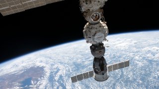 Four main components on the Roscosmos segment of the International Space Station are pictured as the orbital outpost soared above the Andes mountain range in Bolivia.