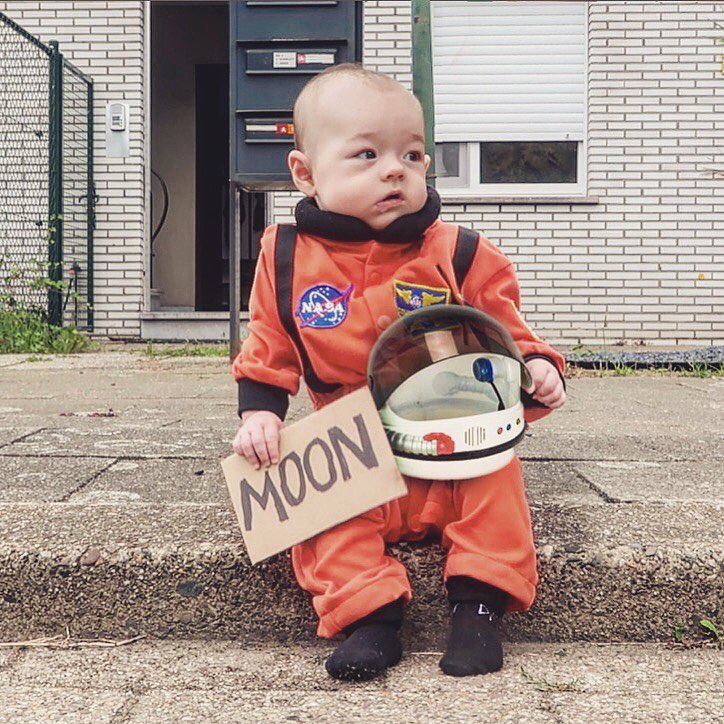 A photoshopped image 3-month old Alix in an astronaut's suit.