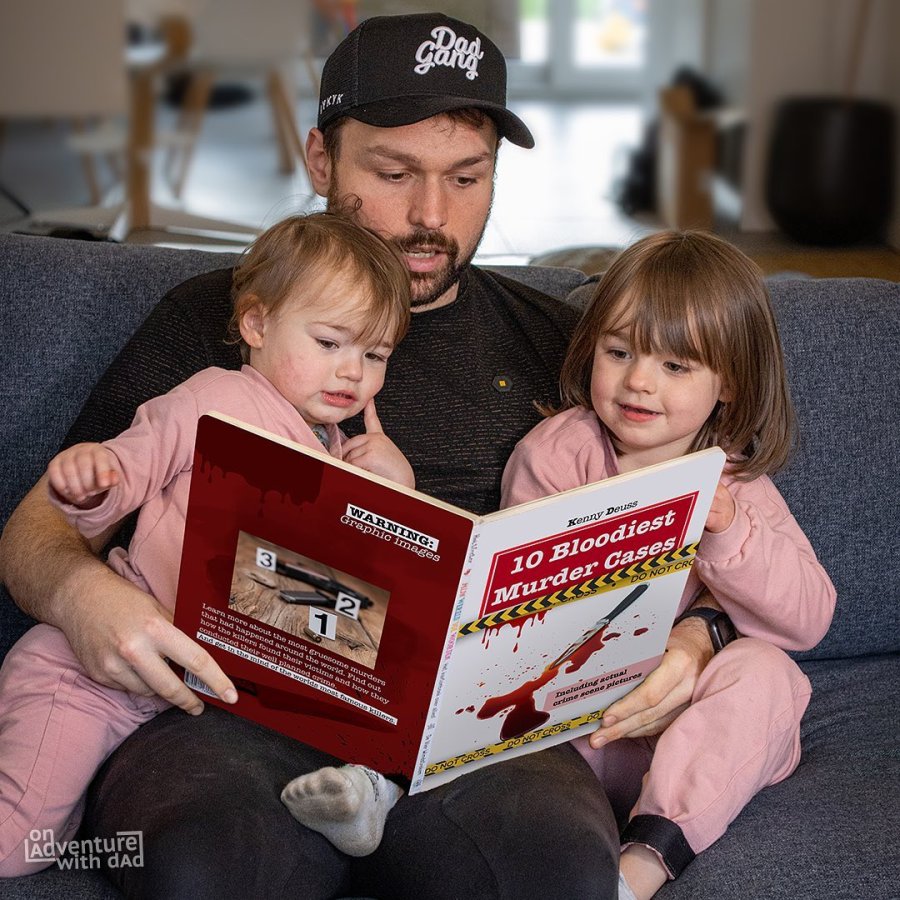 A photoshopped image of Kenny Deuss reading a book to his daughters, Alix and Aster. The book shows a cover reading 