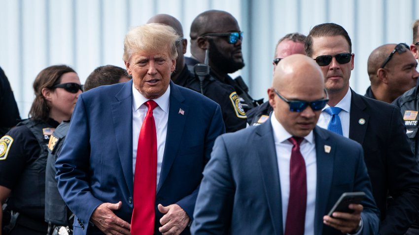 COLUMBUS, GA- JUNE 10: Former President Donald Trump and his aid Walt Nauta (right) arrive at an airport after Trump spoke at the Georgia Republican Party’s state convention on Saturday, June 10, 2023 in Columbus, GA.  (Photo by Jabin Botsford/The Washington Post via Getty Images)