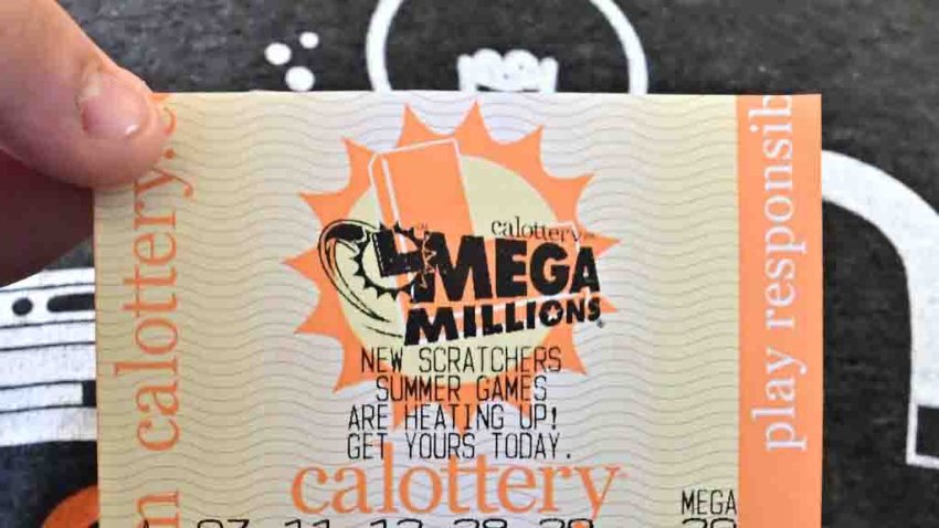 A Mega Millions lottery ticket is displayed in Los Angeles, California, on August 4, 2023. The sixth-largest jackpot in US history is up for grabs tonight after no tickets have been sold with all six numbers in the multi-state Mega Millions game for 30 consecutive draws. (Photo by Frederic J. BROWN / AFP) (Photo by FREDERIC J. BROWN/AFP via Getty Images)