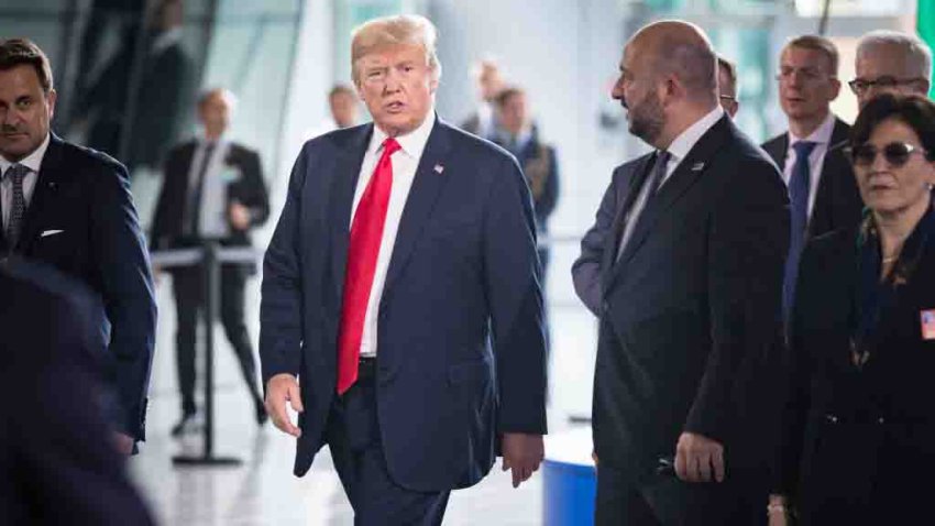 BRUSSELS, BELGIUM – JULY 11:  US President Donald Trump walks through the new NATO Headquarters on the first day of the North Atlantic Treaty Organization (NATO) summit in Brussels on July 11, 2018. (Photo by Xander Heinl/Photothek via Getty Images)