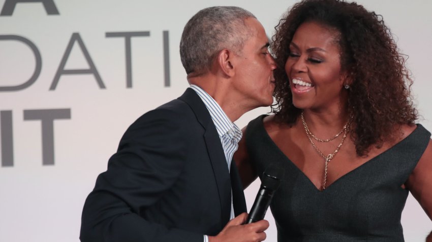 CHICAGO, ILLINOIS – OCTOBER 29: Former U.S. President Barack Obama gives his wife Michelle a kiss as they close the Obama Foundation Summit together on the campus of the Illinois Institute of Technology on October 29, 2019 in Chicago, Illinois. The Summit is an annual event hosted by the Obama Foundation. (Photo by Scott Olson/Getty Images)