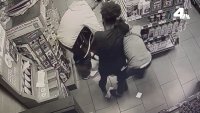 Security camera video shows dog owner confronted by attackers in 7-Eleven