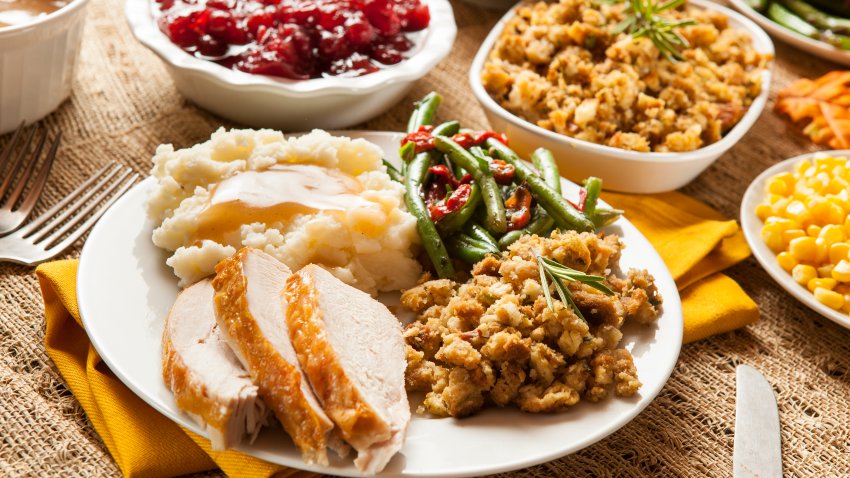 Homemade Turkey Thanksgiving Dinner with Mashed Potatoes, Stuffing, and Corn