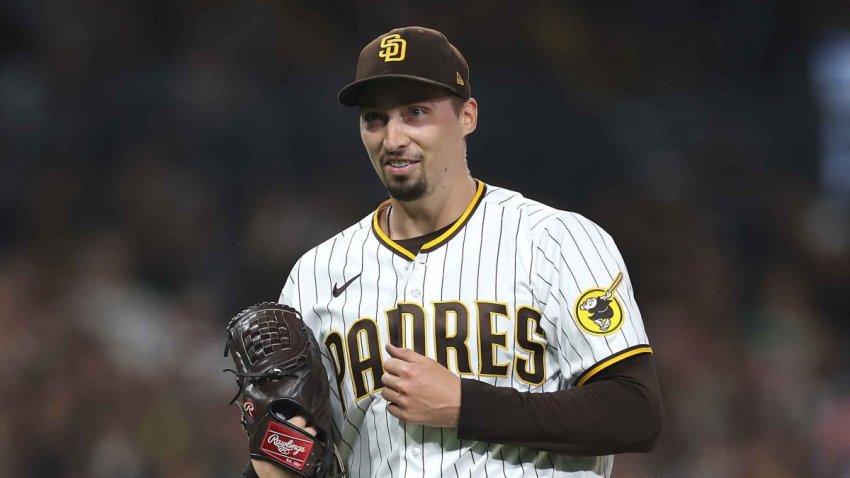 Blake Snell #4 of the San Diego Padres reacts as he walks to the dugout after throwing seven hitless innings a game against the Colorado Rockies at PETCO Park on Sept. 19, 2023, in San Diego.