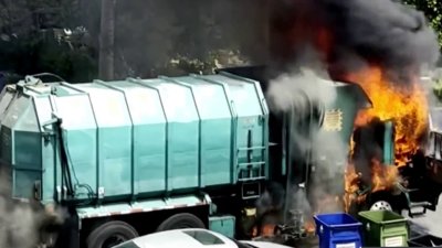 Autos destruidos por explosión de camión de basura