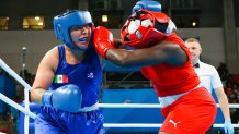 SANTIAGO, CHILE - OCTOBER 20: Yakelin Estornell of Cuba (red) and Citlalli Ortiz of Mexico (blue) compete in Women´s Boxing (57kg) preliminary round as part of the Santiago 2023 Pan Am Games at Centro Nacional de Entrenamiento Olímpico on October 20, 2023, 2023 in Santiago, Chile. (Photo by Gonzalo Gonzalez/Jam Media/Getty Images)