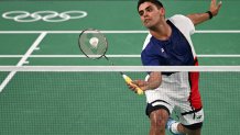 Mexico's Luis Ramon Garrido plays a shot against Taiwan's Chou Tien-chen in the men's singles badminton group stage match during the Paris 2024 Olympic Games at Porte de la Chapelle Arena in Paris on July 28, 2024. (Photo by Arun SANKAR / AFP) (Photo by ARUN SANKAR/AFP via Getty Images)