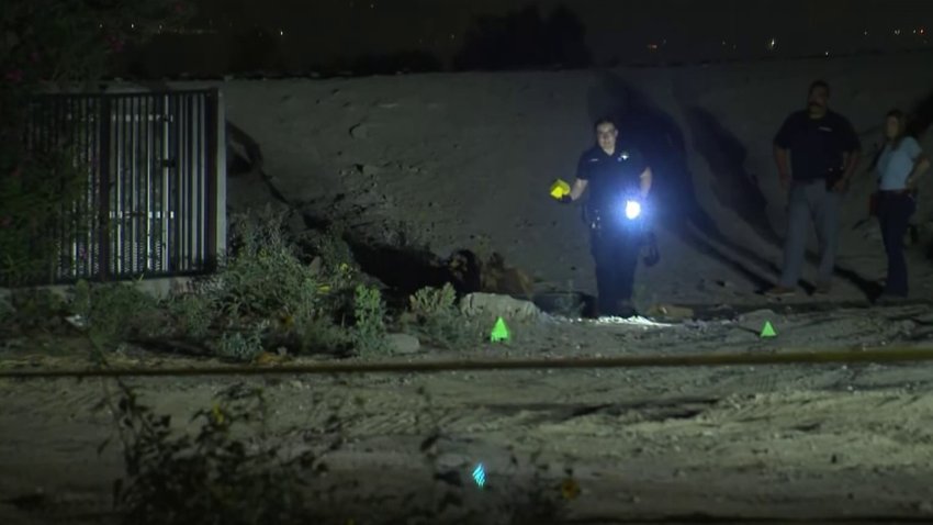 Police at the scene in San Bernardino where a body was discovered.