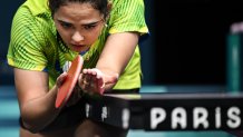 Puerto Rico's Adriana Diaz prepares to serve to North Korea's Pyon Song Gyong during their women's table tennis singles round of 16 at the Paris 2024 Olympic Games at the South Paris Arena in Paris on July 31, 2024. (Photo by JUNG Yeon-je / AFP) (Photo by JUNG YEON-JE/AFP via Getty Images)