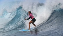 Costa Rica's Brisa Hennessy takes off on a wave in the women's surfing round 3, during the Paris 2024 Olympic Games, in Teahupo'o, on the French Polynesian Island of Tahiti, on August 1, 2024. (Photo by Jerome BROUILLET / AFP) (Photo by JEROME BROUILLET/AFP via Getty Images)