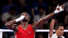 PARIS, FRANCE - AUGUST 2: Cristian Javier Pinales of Dominican Republic celebrates after winning the Men's 80kg Quarterfinal match against Gabrijel Veocic of Croatia during the Men's 80kg Quarterfinal match on day seven of the Olympic Games Paris 2024 at North Paris Arena on August 2, 2024 in Paris, France. (Photo by Pixsell/MB Media/Getty Images)