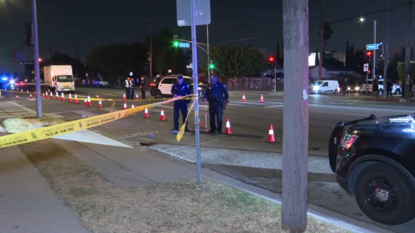 Police investigate a deadly hit-and-run in North Hollywood on Friday, Aug. 16, 2024.