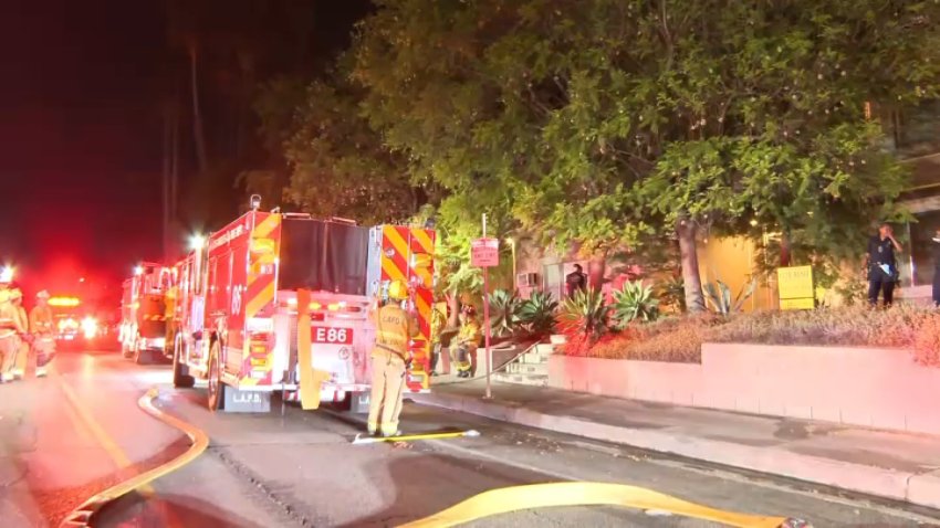 Firefighters respond to a fire in Studio City on Monday, Aug. 5, 2024.
