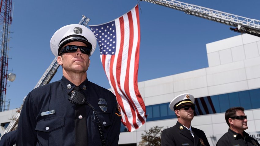 Members of the Los Angeles County Fire Department during a memorial in honor of the first responders killed in the World Trade Center terror attacks on September 11, 2001. Los Angeles, California, September 8, 2016. (Photo by Ronen Tivony/NurPhoto via Getty Images)