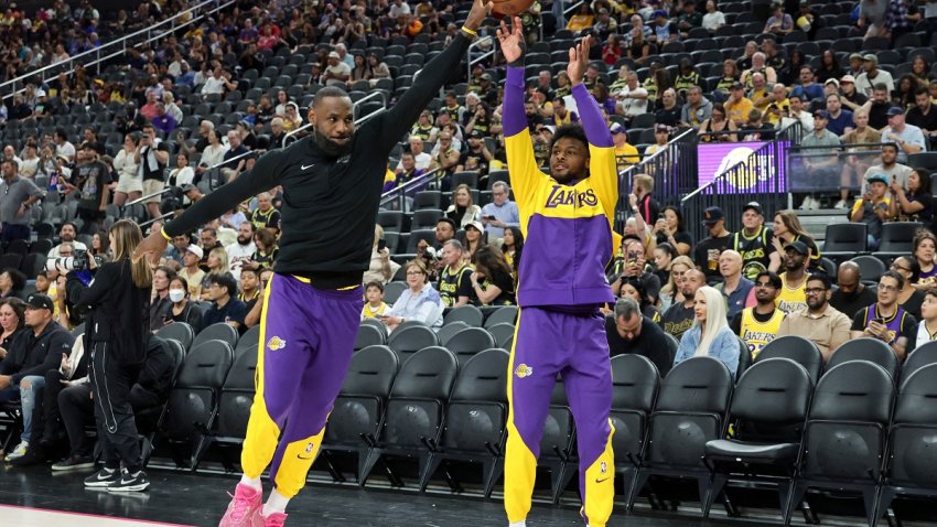 LAS VEGAS, NEVADA – OCTOBER 15: LeBron James (L) #23 of the Los Angeles Lakers blocks a 3-point shot by his son Bronny James #9 of the Lakers as they warm up before a preseason game against the Golden State Warriors at T-Mobile Arena at T-Mobile Arena on October 15, 2024 in Las Vegas, Nevada. The Warriors defeated the Lakers 111-97. NOTE TO USER: User expressly acknowledges and agrees that, by downloading and or using this photograph, User is consenting to the terms and conditions of the Getty Images License Agreement. (Photo by Ethan Miller/Getty Images)