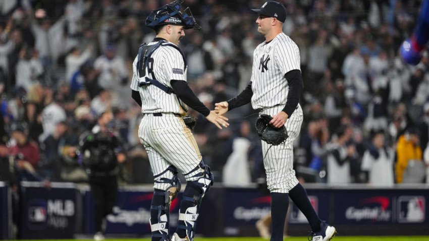 NEW YORK, NY – OCTOBER 29: Austin Wells #28 and Tim Mayza #58 of the New York Yankees celebrate after winning Game 4 of the 2024 World Series presented by Capital One between the Los Angeles Dodgers and the New York Yankees at Yankee Stadium on Tuesday, October 29, 2024 in New York, New York. The New York Yankees won 11-4. (Photo by Mary DeCicco/MLB Photos via Getty Images)