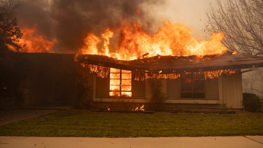 A house is engulfed in flames as the Santa Ana wind-fed Mountain fire scorches acres, in Camarillo, California, on November 6, 2024. A wildfire fanned by powerful winds was burning out of control near Los Angeles on November 6, with scores of residents ordered to evacuate and some taken to hospital.
Fierce gusts up to 80 miles (130 kilometers) an hour were pushing smoke sideways and fueling flames that were tearing through farmland. (Photo by ETIENNE LAURENT / AFP) (Photo by ETIENNE LAURENT/AFP via Getty Images)