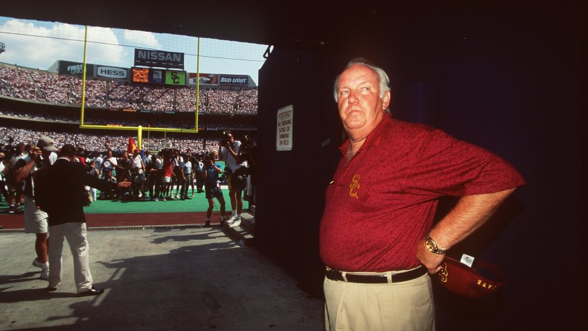 25 Aug 1996:  Head coach John Robinson of the USC Trojans enters the field during the Trojans 24-7 Kickoff Classic loss to Penn State at Meadowlands Stadium in East Rutherford, New Jersey. Mandatory Credit: Al Bello/Allsport