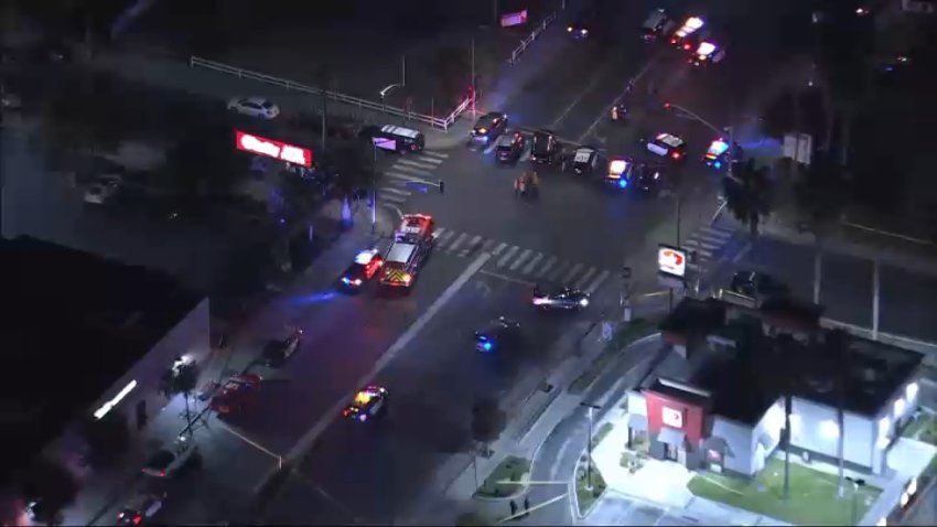 Law enforcement responds to the scene of a shooting in Long Beach on Tuesday, Nov. 19, 2024.