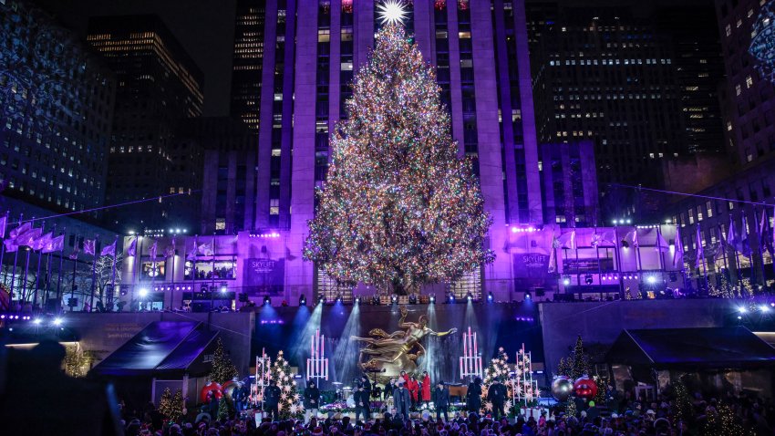 The Rockefeller Center tree is illuminated during the tree lighting ceremony in New York on December 4, 2024. (Photo by KENA BETANCUR / AFP) (Photo by KENA BETANCUR/AFP via Getty Images)