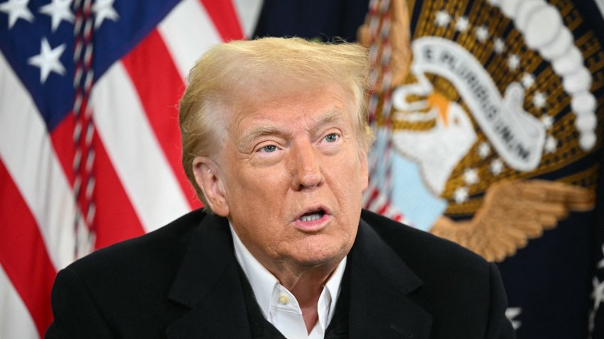 US President Donald Trump speaks at a Hurricane Helene recovery briefing in a hangar at the Asheville Regional Airport in Fletcher, North Carolina, on January 24, 2025. Trump said he may “get rid of FEMA,” if deemed necessary. The Federal Emergency Management Agency (FEMA) is tasked coordinating the response to a disaster. (Photo by Mandel NGAN / AFP) (Photo by MANDEL NGAN/AFP via Getty Images)