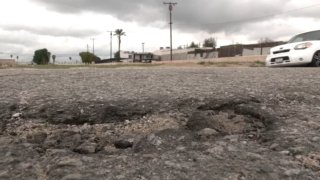 A street due for repairs in San Bernardino.