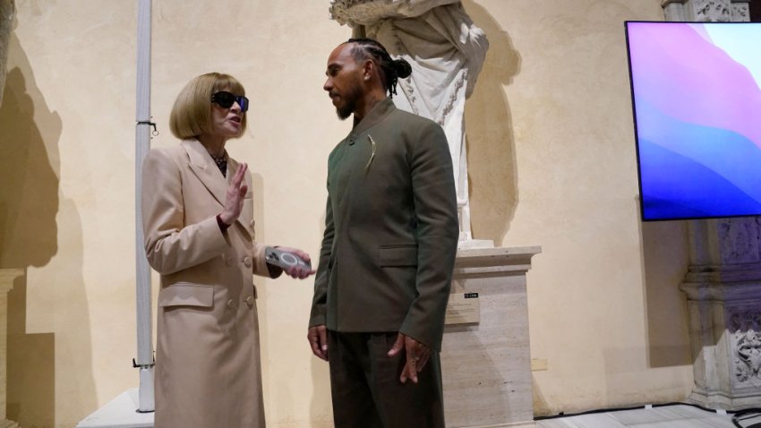 Met Gala celebrity chairs Lewis Hamilton poses with Vogue editor Anna Wintour at the Metropolitan Museum of Art’s Costume Institute during a press conference October 9, 2024 to announce the Met Gala theme “Superfine: Tailoring Black Style,” that will be launched by the Met Gala on May 5. (Photo by TIMOTHY A. CLARY / AFP) (Photo by TIMOTHY A. CLARY/AFP via Getty Images)