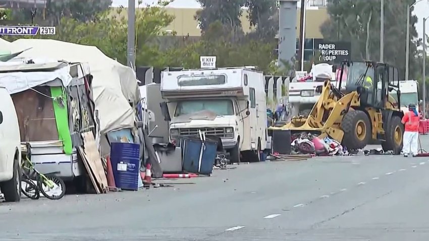 A homeless encampment cleanup operation in Gardena Wednesday April 30, 2025.