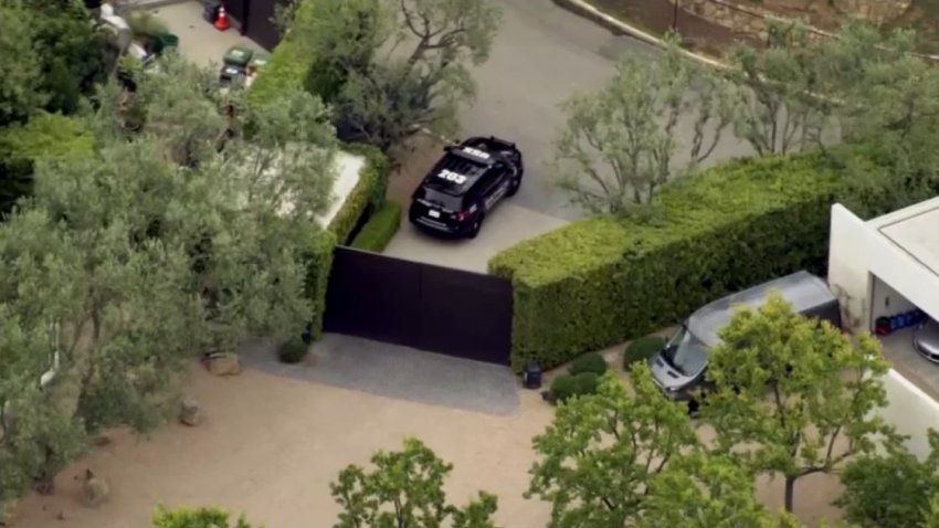 Aerial view of gate outside Jennifer Aniston's Bel Air home.