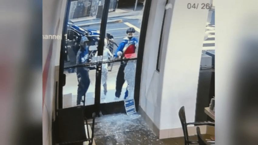 A group of burglars were seen on security camera footage, breaking in through the glass door of a bakery in Long Beach,