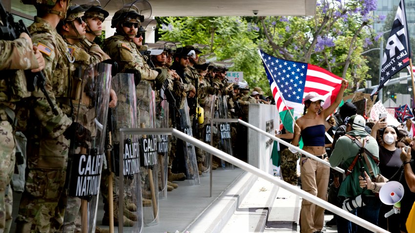 Protesters stand off against California National Guard soldiers at the Federal Building in downtown Los Angeles during a “No Kings” protest on Saturday, June 14, 2025. (AP Photo/Richard Vogel)