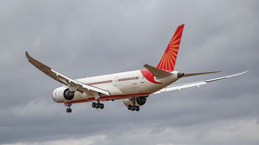 Air India Boeing 787 Dreamliner aircraft as seen on final approach flying for landing at London Heathrow airport during a cloudy day over Myrtle Avenue, a famous planespotting location. The modern and advanced Boeing 787-8 wide body passenger plane has the registration VT-ANW and is powered by 2x GE jet engines. Air India is the Indian flag carrier with headquarters at New Delhi and member of Star Alliance aviation group. Air India is owned by Tata Group, formerly AirIndia Limited was owned by the Government of India. London Heathrow Airport LHR, United Kingdom on August 2022 (Photo by Nicolas Economou/NurPhoto via Getty Images)