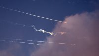 This photo shows rocket trails and intercepts in the sky over the Israeli city of Netanya on June 14, 2025. Iran struck Israel early June 14 with barrages of missiles after a massive onslaught targeted the Islamic republic’s nuclear and military facilities, and killed several top generals. (Photo by JACK GUEZ / AFP) (Photo by JACK GUEZ/AFP via Getty Images)