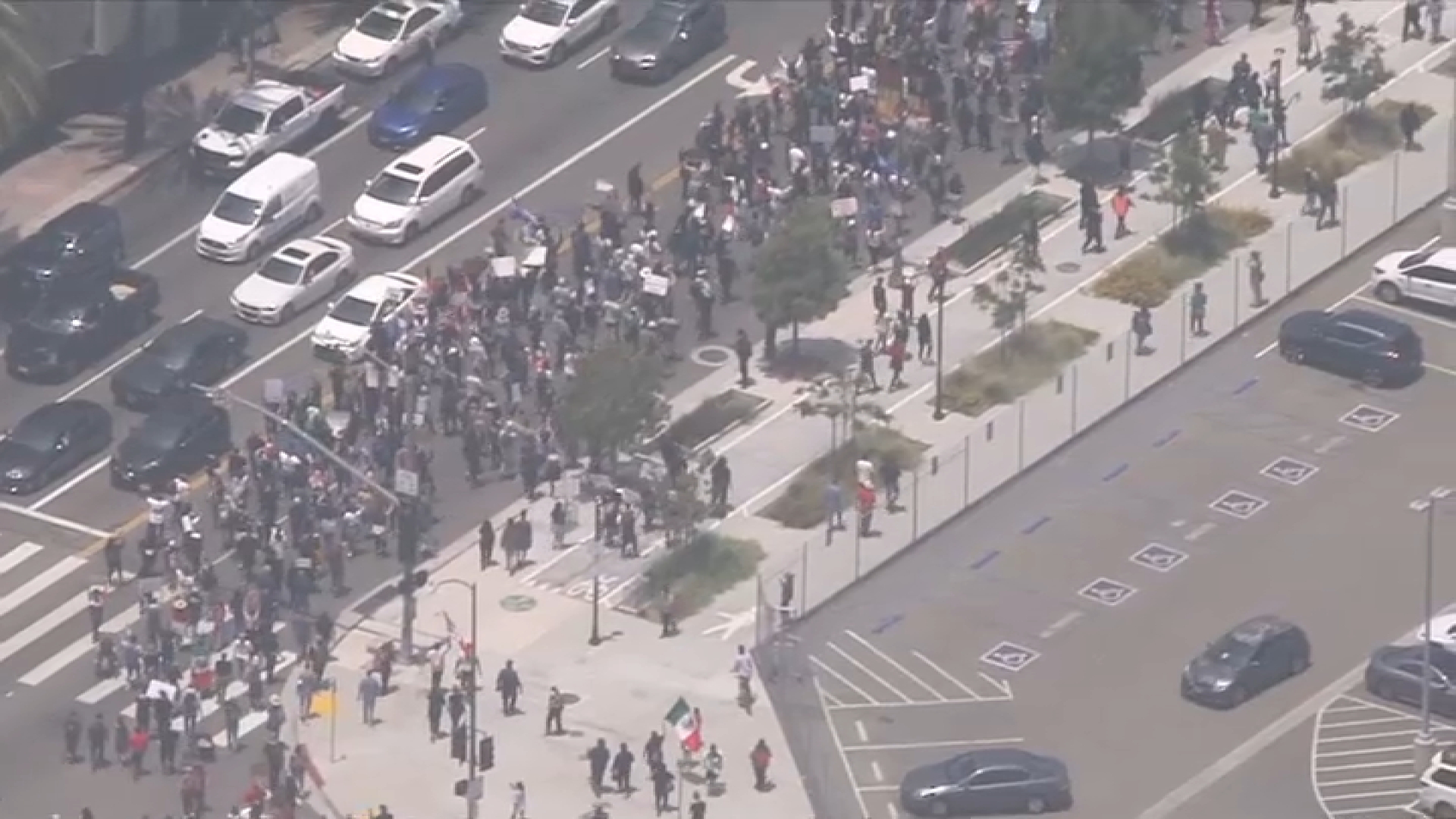 Protesters march Sunday June 8, 2025 in downtown Los Angeles.