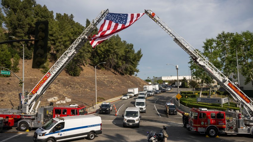 Los Angeles, CA – July 18:Los Angeles County Fire sets up their ladder trucks for a procession for the three Los Angeles County Sheriff’s deputies killed following an explosion at the L.A. County Sheriff’s training facility in East Los Angeles on Friday, July 18, 2025. (Photo by Sarah Reingewirtz/MediaNews Group/Los Angeles Daily News via Getty Images)