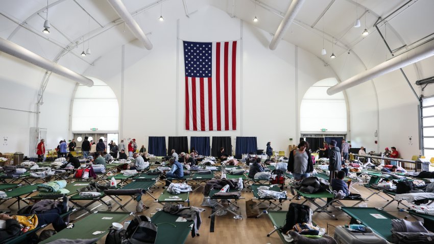 Fountain Valley, CA – May 23, 2026: People’s belongings are spread out on cots in the Freedom Hall, after taking refuge due to the chemical leak at GKN Aerospace Transparency building, on Saturday, May 23, 2026 in Fountain Valley, CA. Tens of thousands told to evacuate after a 34,000-gallon tank of methyl methacrylate leaked at an aerospace plastics facility, sending potentially toxic vapors into the air. (Allen J. Schaben/Los Angeles Times via Getty Images)