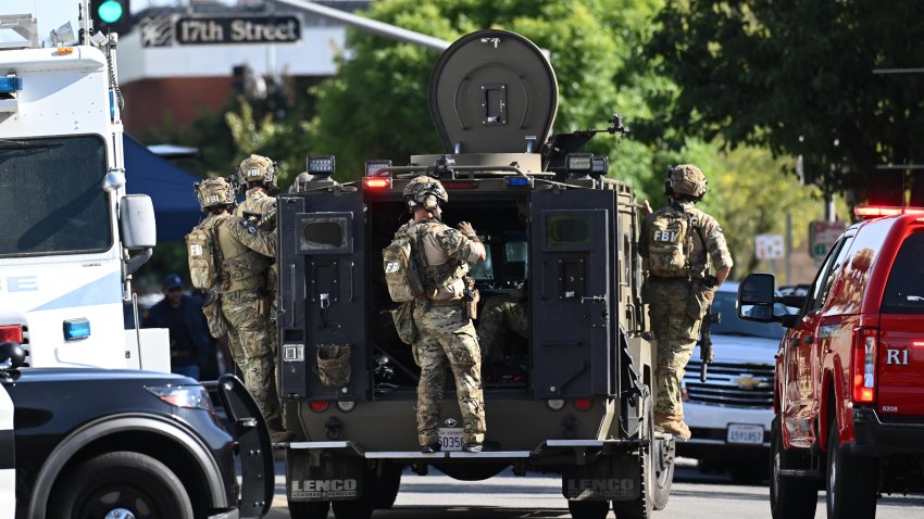 FBI agents respond after a man barricaded himself inside a building with hostages Tuesday, June 2, 2026, in Bakersfield, Calif.
