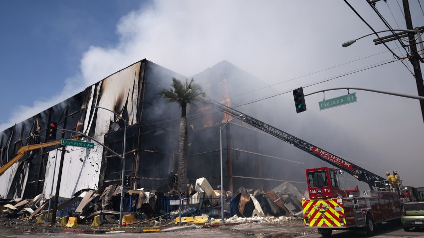 A fire burns at Lineage cold storage warehouse fire on Monday, June 22, 2026 in Los Angeles.