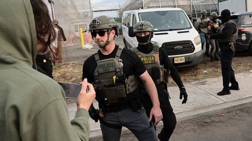 NEWARK, NEW JERSEY – MAY 27: Immigration and Customs Enforcement (ICE) agents block protesters as cars exit Delaney Hall, which is being used as an Immigration and Customs Enforcement detention center, on May 27, 2026 in Newark, New Jersey. The protests, which have become tense over the holiday weekend, come amid reports of an ongoing hunger strike by detainees.  (Photo by Michael M. Santiago/Getty Images)