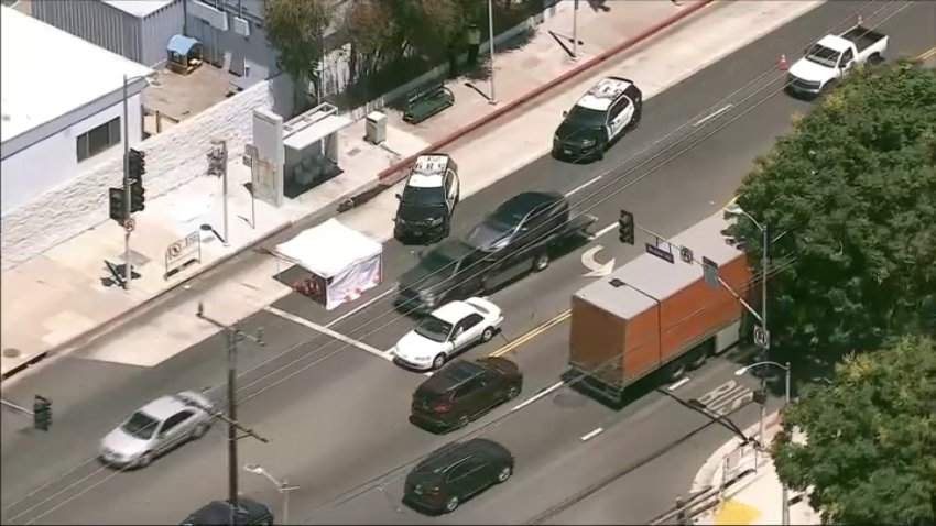 Police investigate a crash involving a teen on an e-bike and an SUV in Van Nuys on Wednesday, July 22, 2026.