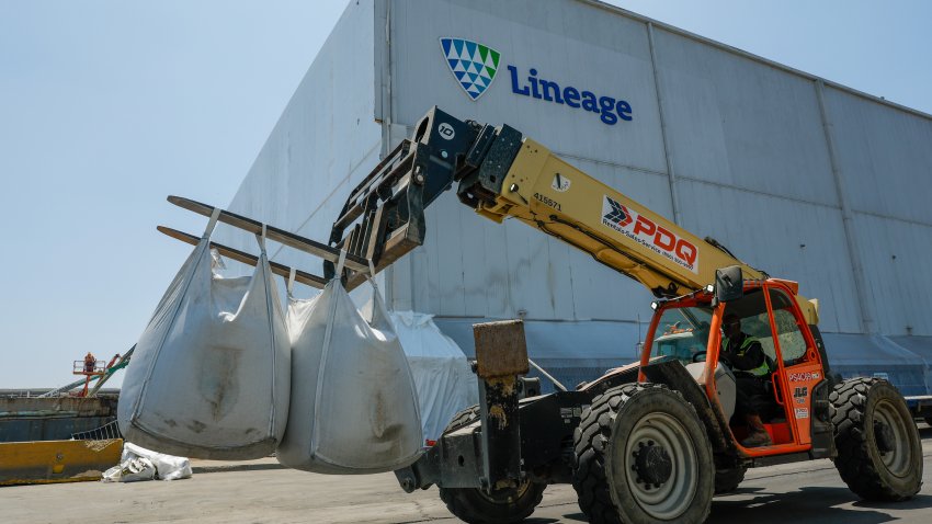A forklift carries various bags of waste in front of Lineage Logistics on Wednesday, Aug. 5, 2026 in Los Angeles.