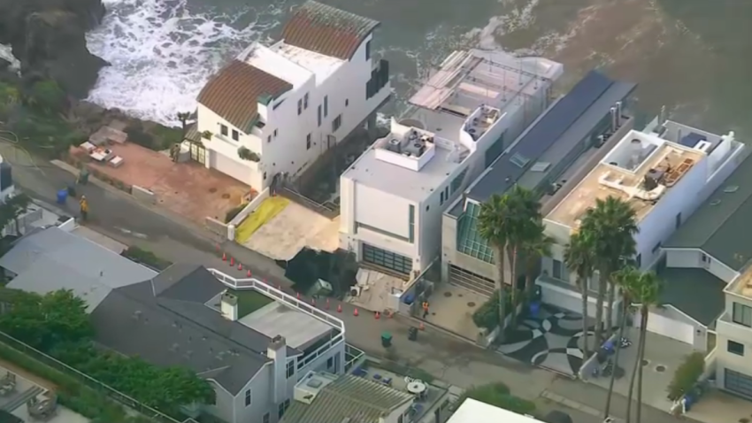 A sinkhole in front of a Malibu home.